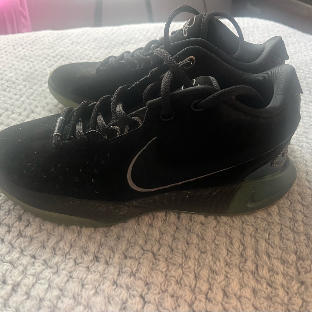 Boys black and green Nikes shoes